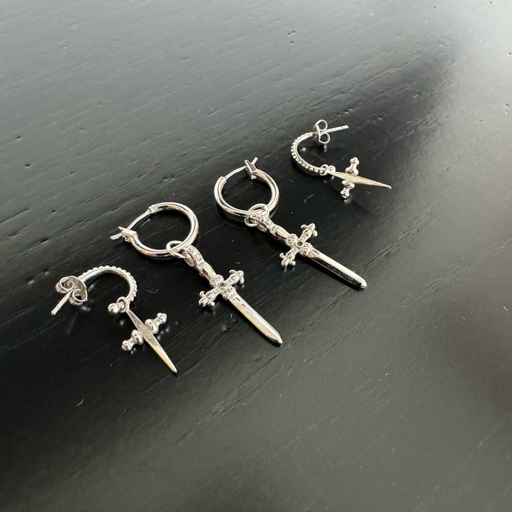 Silver cross huggie earrings